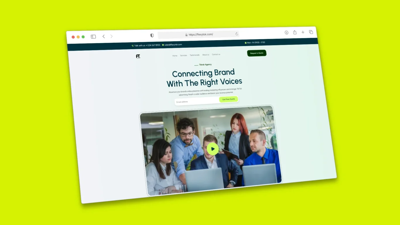 A group of professionals gathered around laptops in a modern office, collaborating on strategies for TikTok advertising